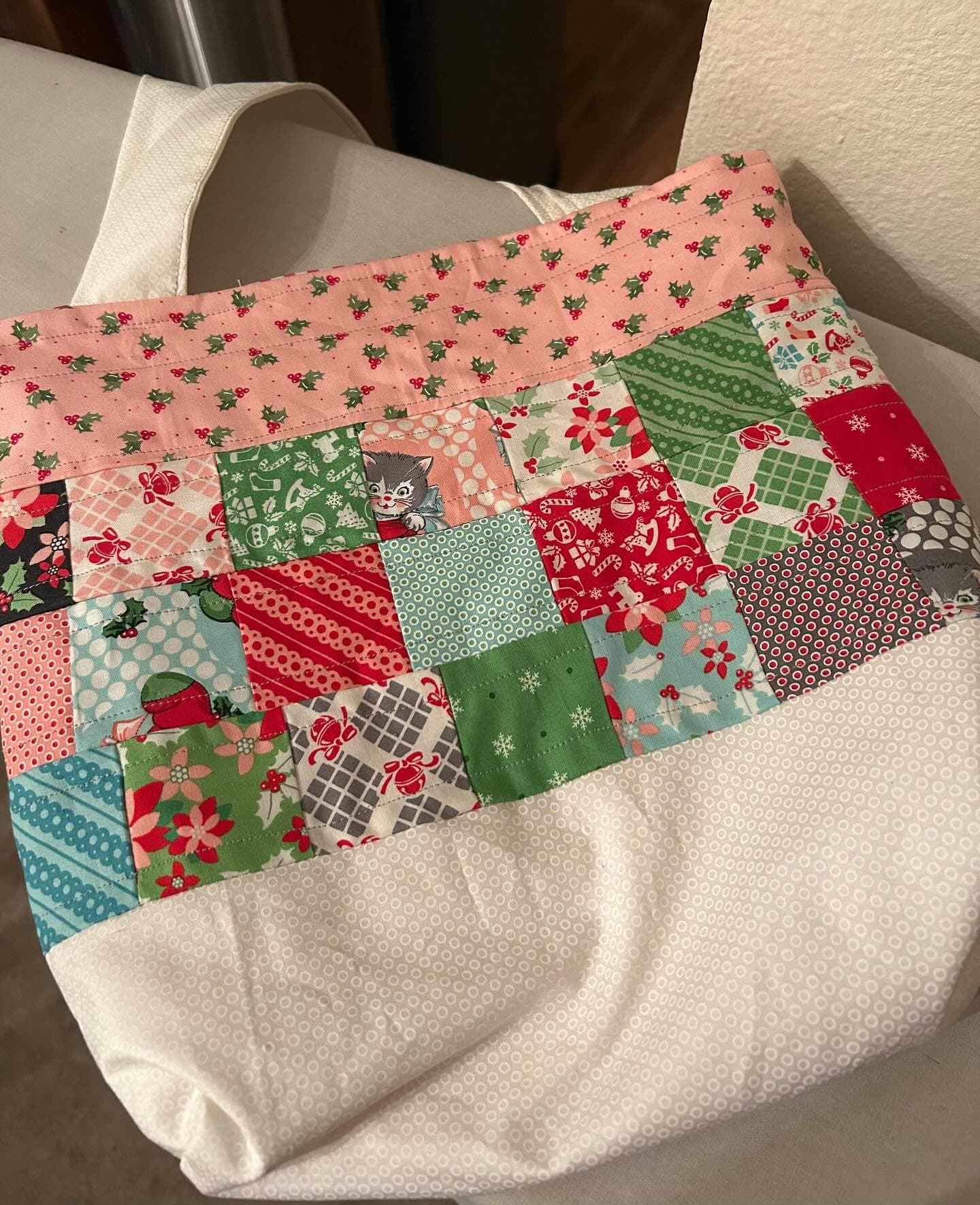 <p>Sabrina began sewing in March 2024 and has fallen in love with the craft! From her first project of a simple pillowcase to a full cosplay, it was quite a year of learning and fun! Ahead of the holidays, she became quite obsessed with making these quilted tote bags from an Erica Arndt tutorial found on YouTube. Using a mini charm pack and a few fat quarters, these bags are a dream to whip up! You can follow her sewing page @unseamlybehavior ✨</p>